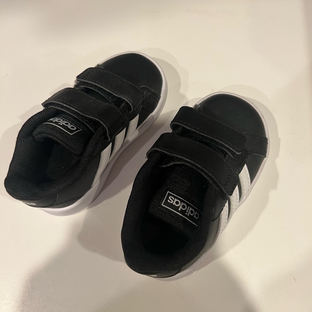 Baby adidas size 5k. Never worn.